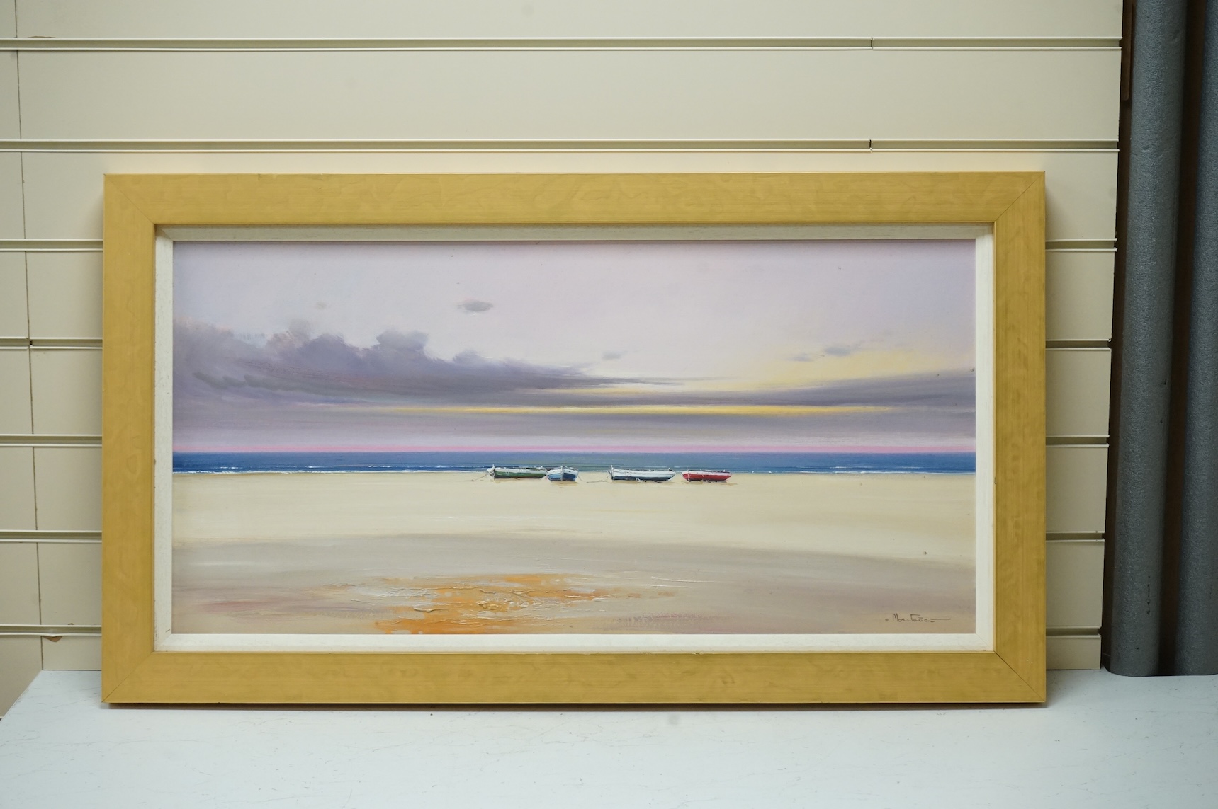 Contemporary oil on canvas, Coastal view with beached fishing boats, indistinctly signed, 39 x 79cm
